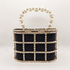 Hollow Pearl Buckle Birdcage Clutch