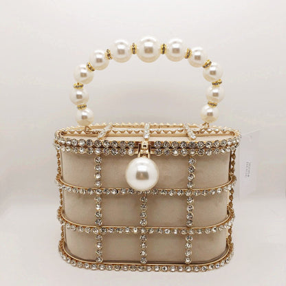 Hollow Pearl Buckle Birdcage Clutch